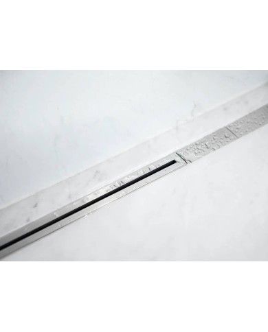 Caniveau drain Twiggi Carrodrain en inox, design minimaliste et élégant, intégré au sol.