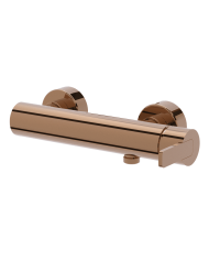 Mélangeur douche encastré Lounge Cifial en finition cuivrée, design cylindrique élégant.