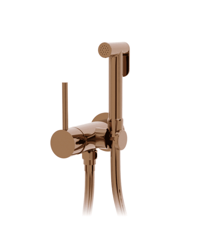 Douchette WC ST25S Cifial avec finition cuivrée, tuyau flexible et support mural élégant.