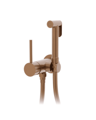 Douchette WC ST25S Cifial en finition cuivrée avec poignée ronde et tuyau flexible.